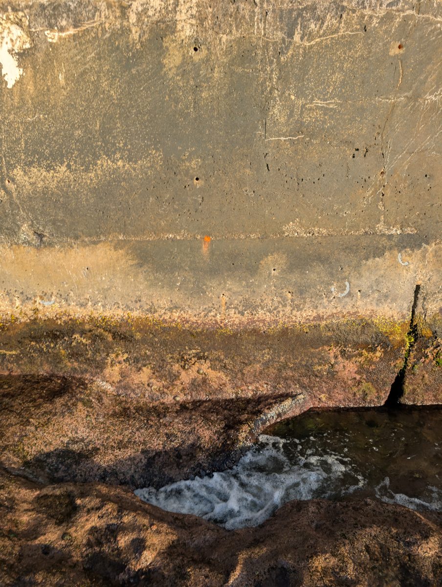 Mauke tide-gauge placement: Tide gauge was placed beside the Mauke harbor road in a protected low-tide hole.